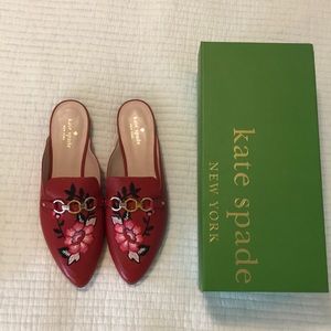 Kate Spade red leather mules.